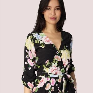 Yumi Kim romper size Large black with pink/yellow/blue flowers